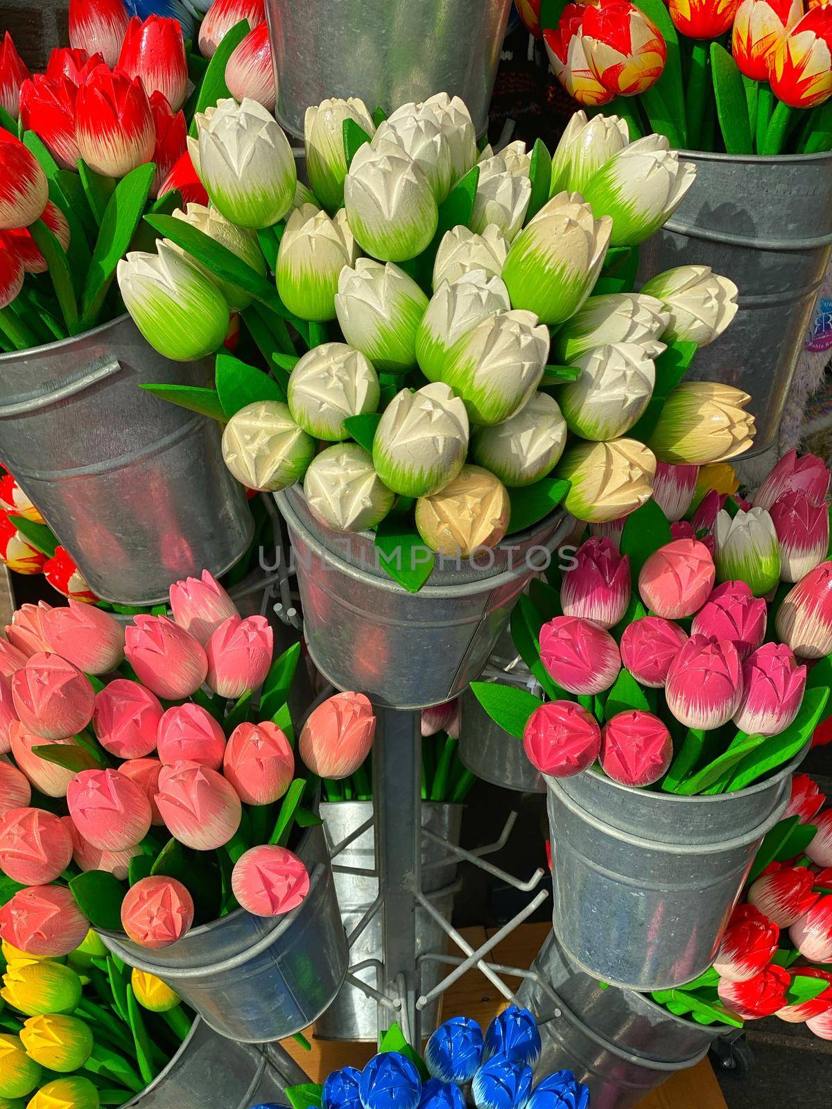 Wooden tulips in the shop in Volendam. Volendam is a town in North Holland, 20 kilometres north of Amsterdam. Sometimes called The pearl of the Zuiderzee.