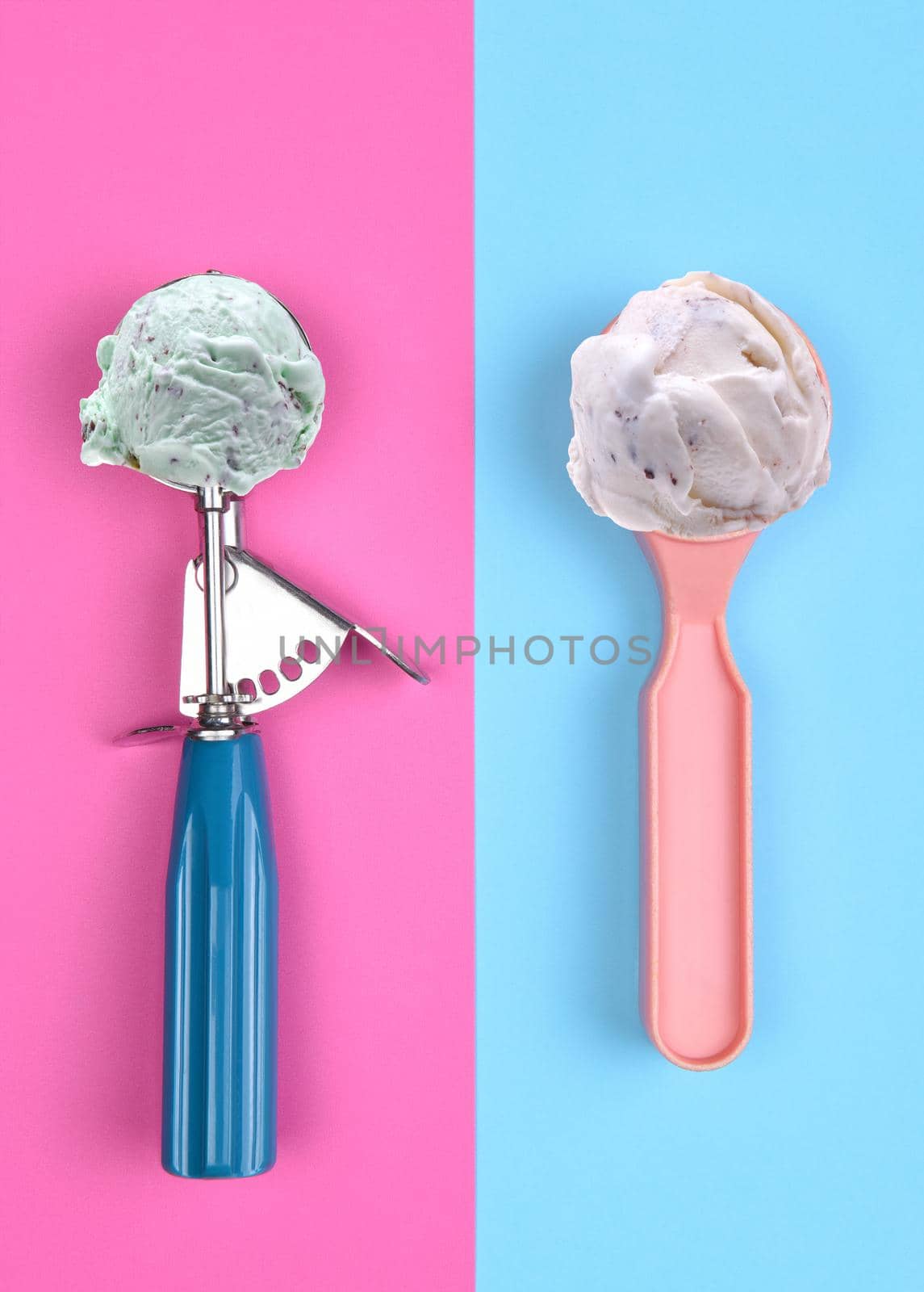 Mint Chip and Vanilla Chocolate Chip Ice Cream Scoops high angle flat lay on pink and blue background.