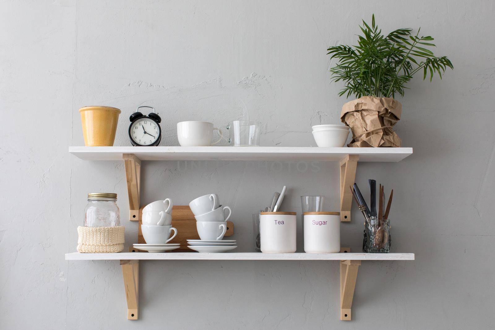 Utensils and mugs on shelf by Demkat