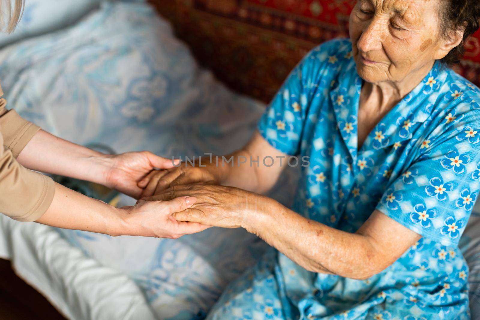 Senior woman with her home caregiver