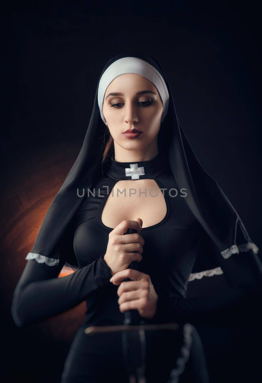a nun with a weapon in the name of faith by Rotozey