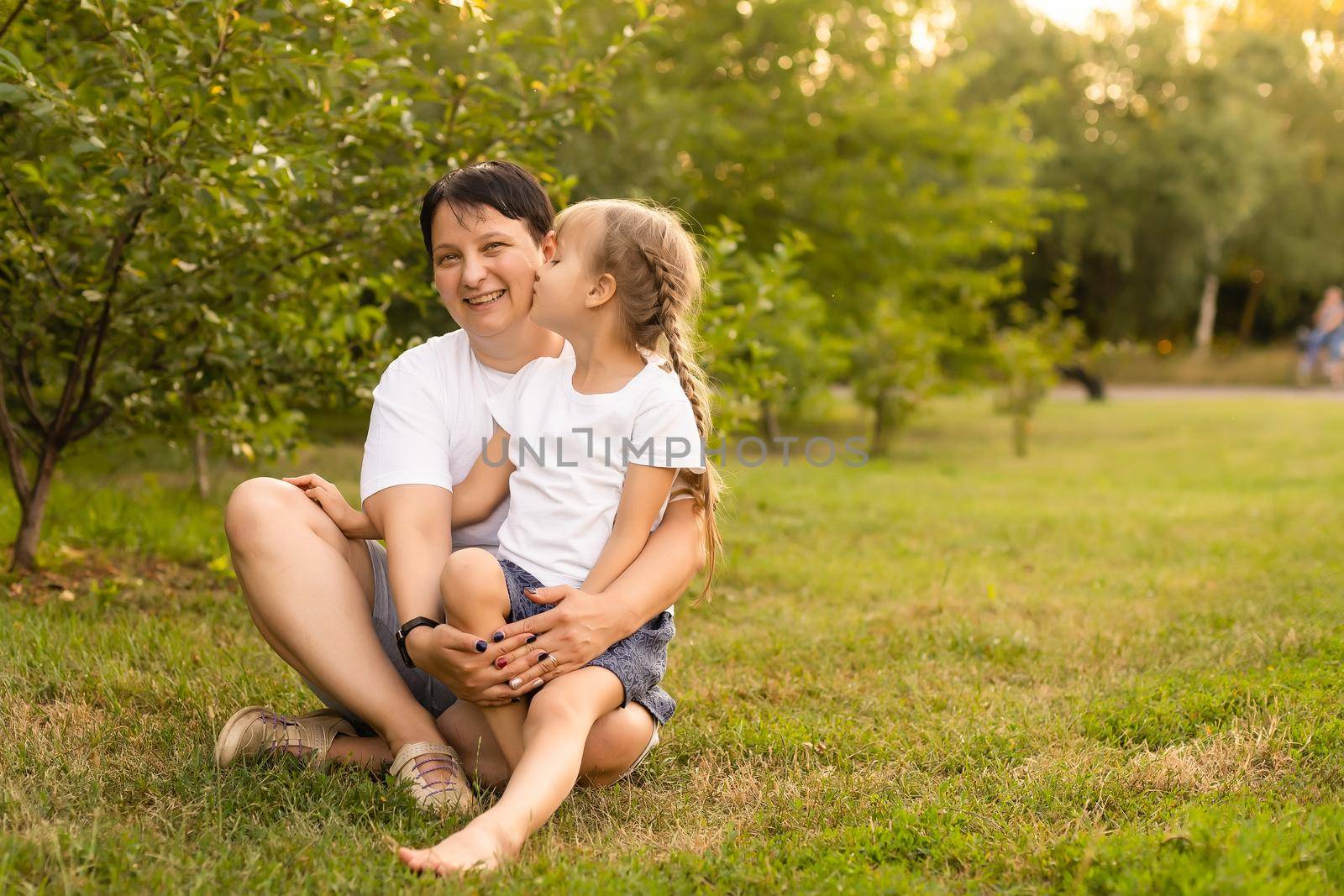 mother and daughter playing summer