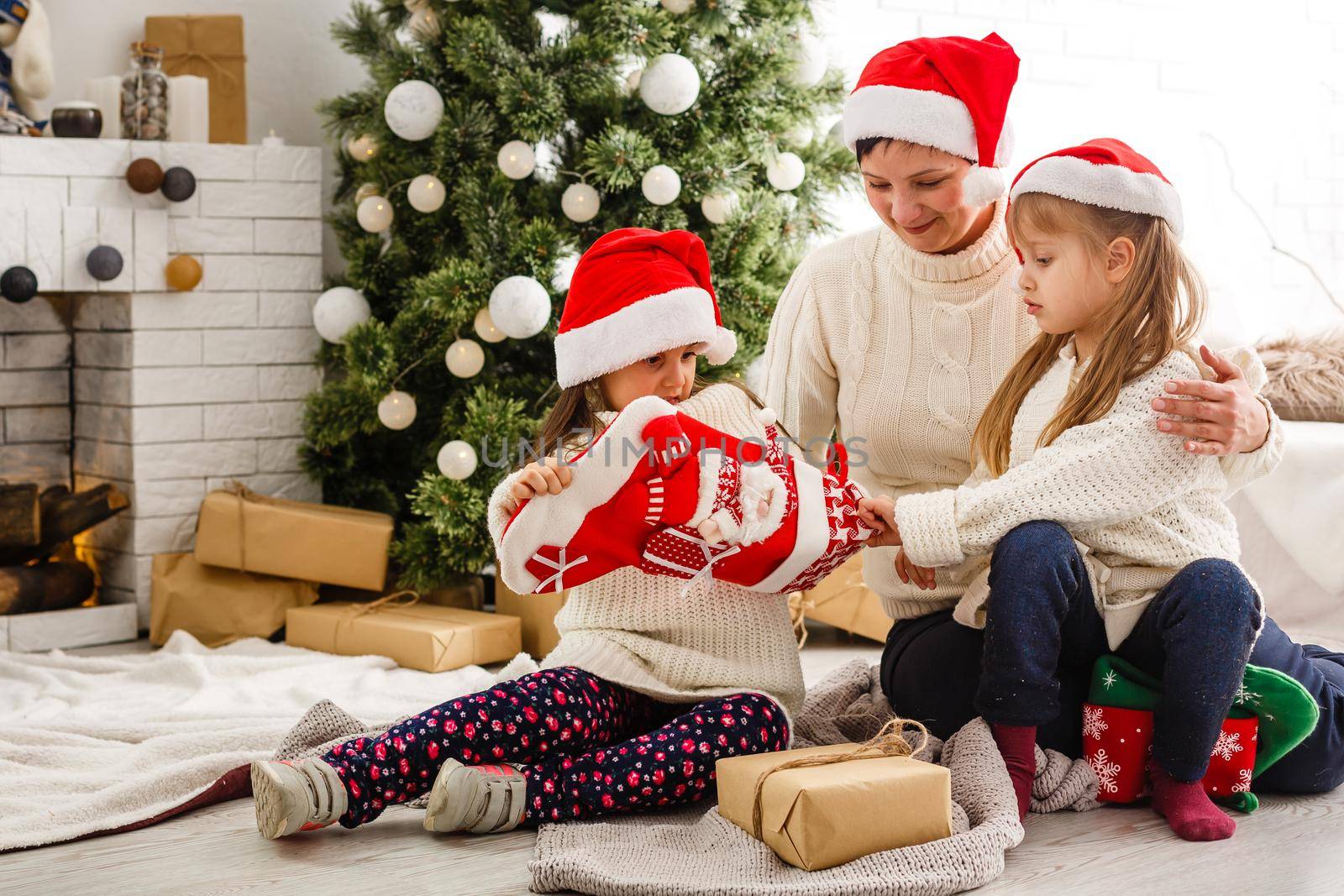 friendly family in Christmas morning by Andelov13