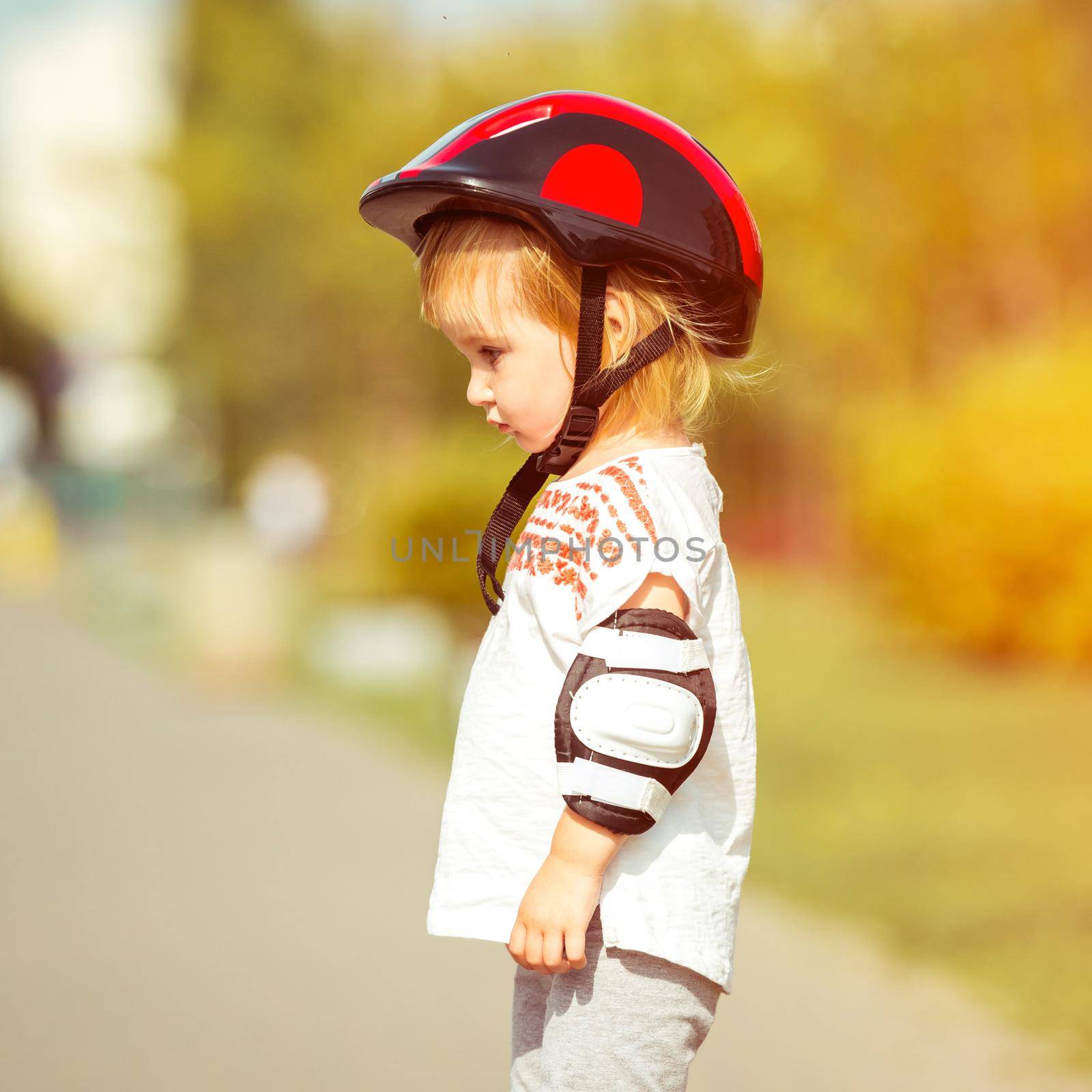 two year old in a helmet by tan4ikk1