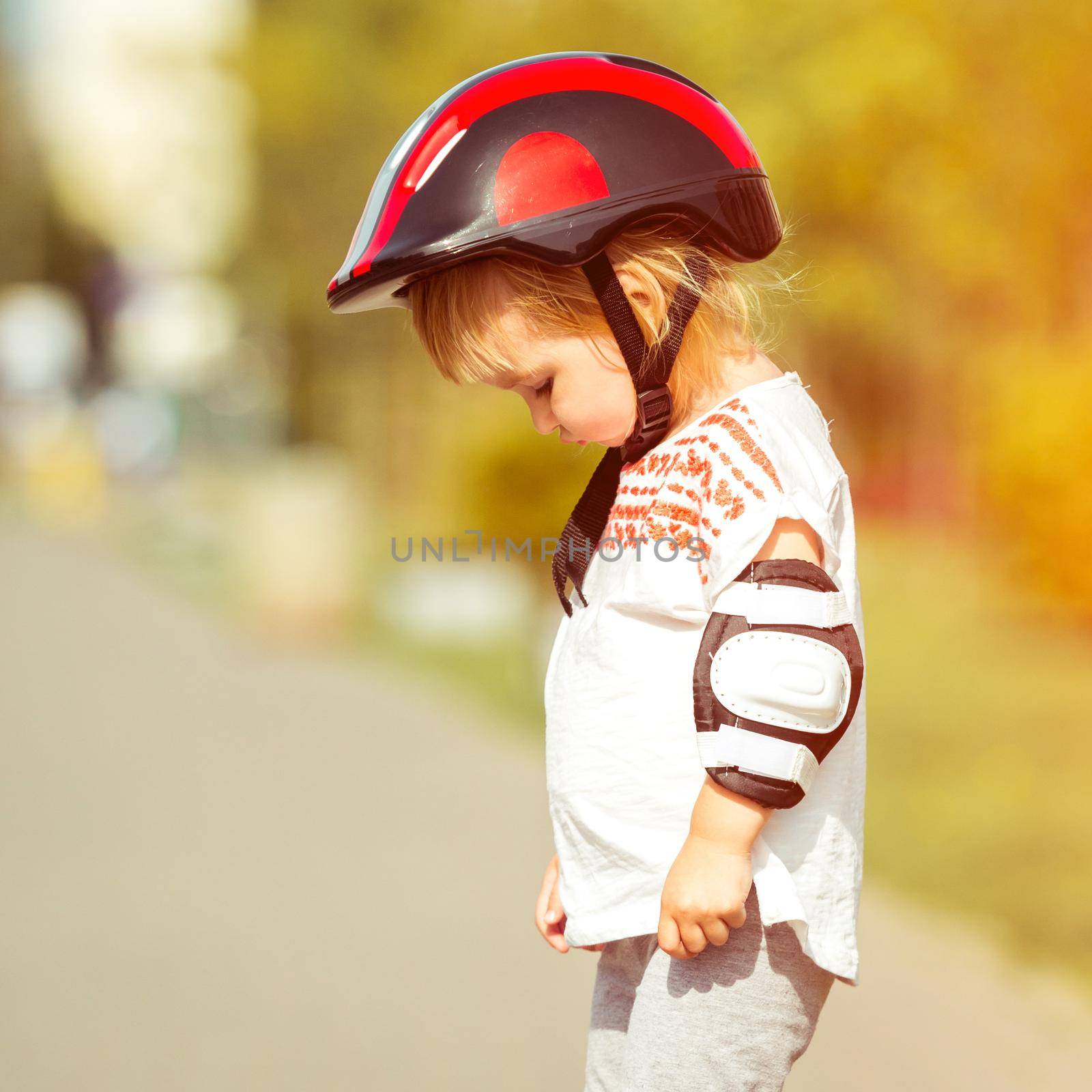 two year old in a helmet by tan4ikk1