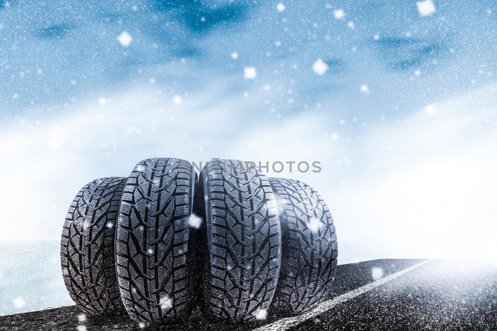 Car tires on winter road.