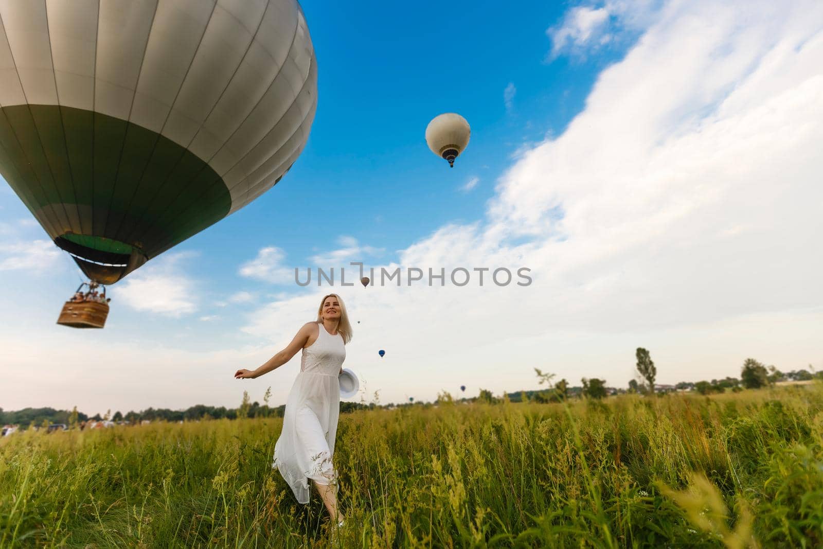 woman and a hot air balloon, summer