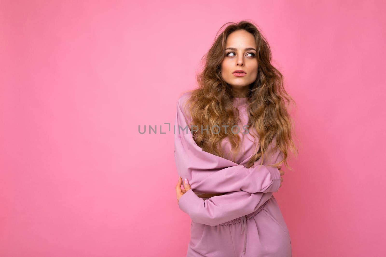 Close-up portrait of nice-looking attractive lovely lovable pretty cute winsome gorgeous cheerful cheery wavy-haired blonde woman isolated on pastel color background wearing stylish clothes.