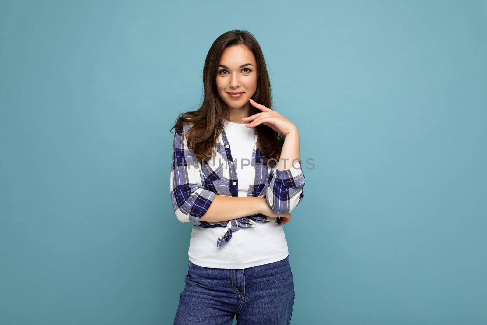 Photo shot of cute nice charming gorgeous attractive pretty youngster happy woman wearing stylish clothes isolated over colorful background with copy space.