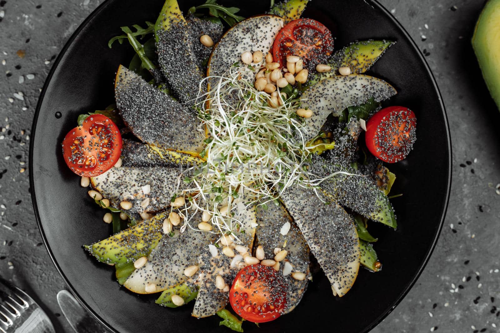salad with avocado poppy seeds and pear. Fresh dietary salad. Healthy breakfast by UcheaD