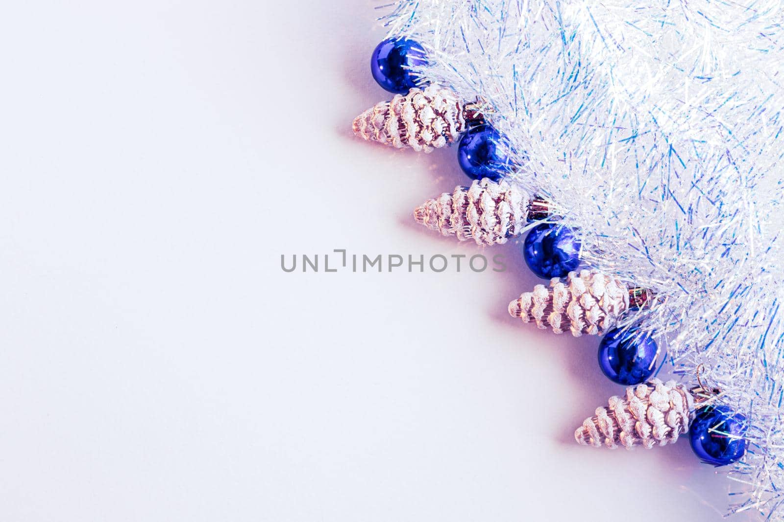 Christmas composition. Christmas decorations blue and gold on a light background. Flat lay, top view, copy space by levnat09