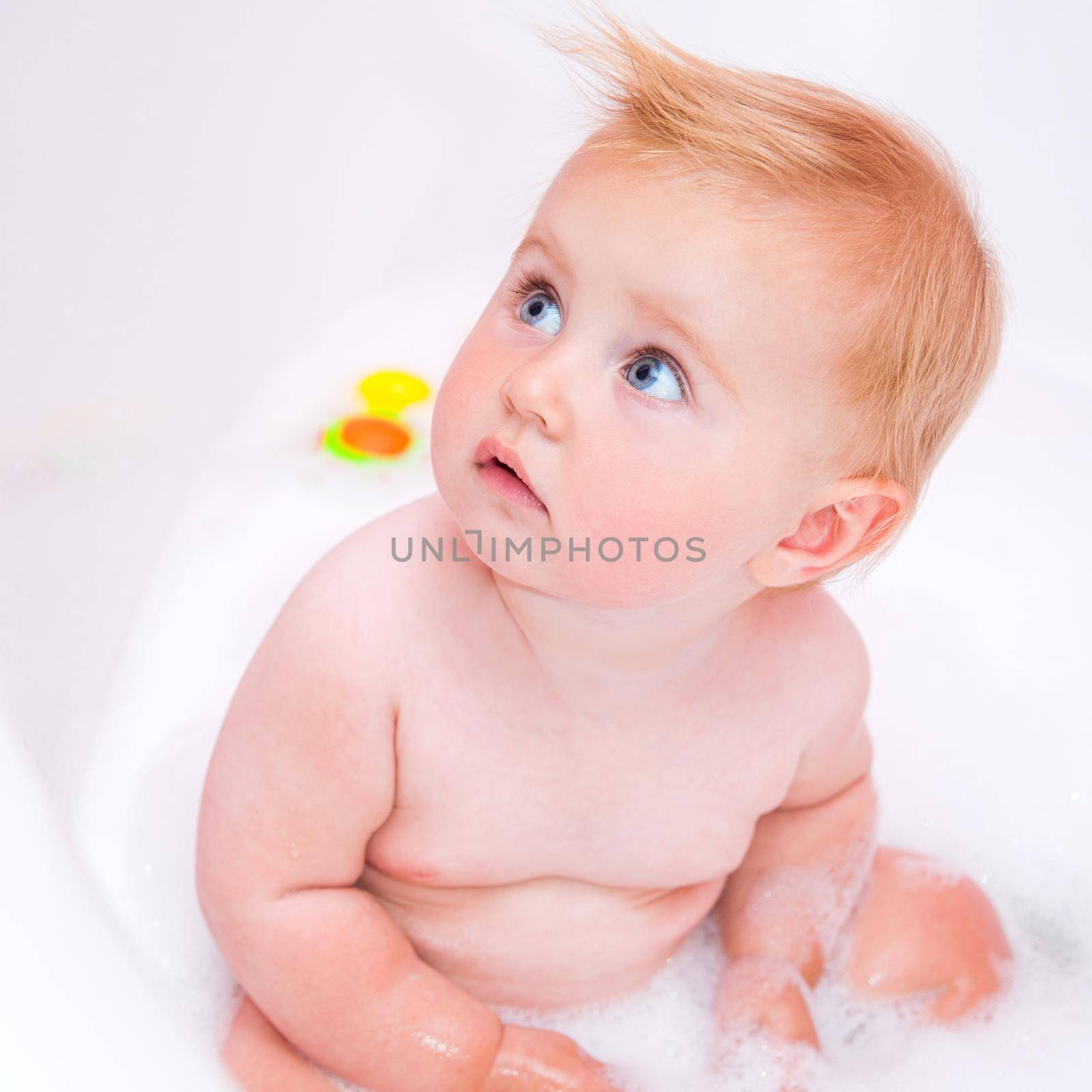 baby is taking a bath by tan4ikk1