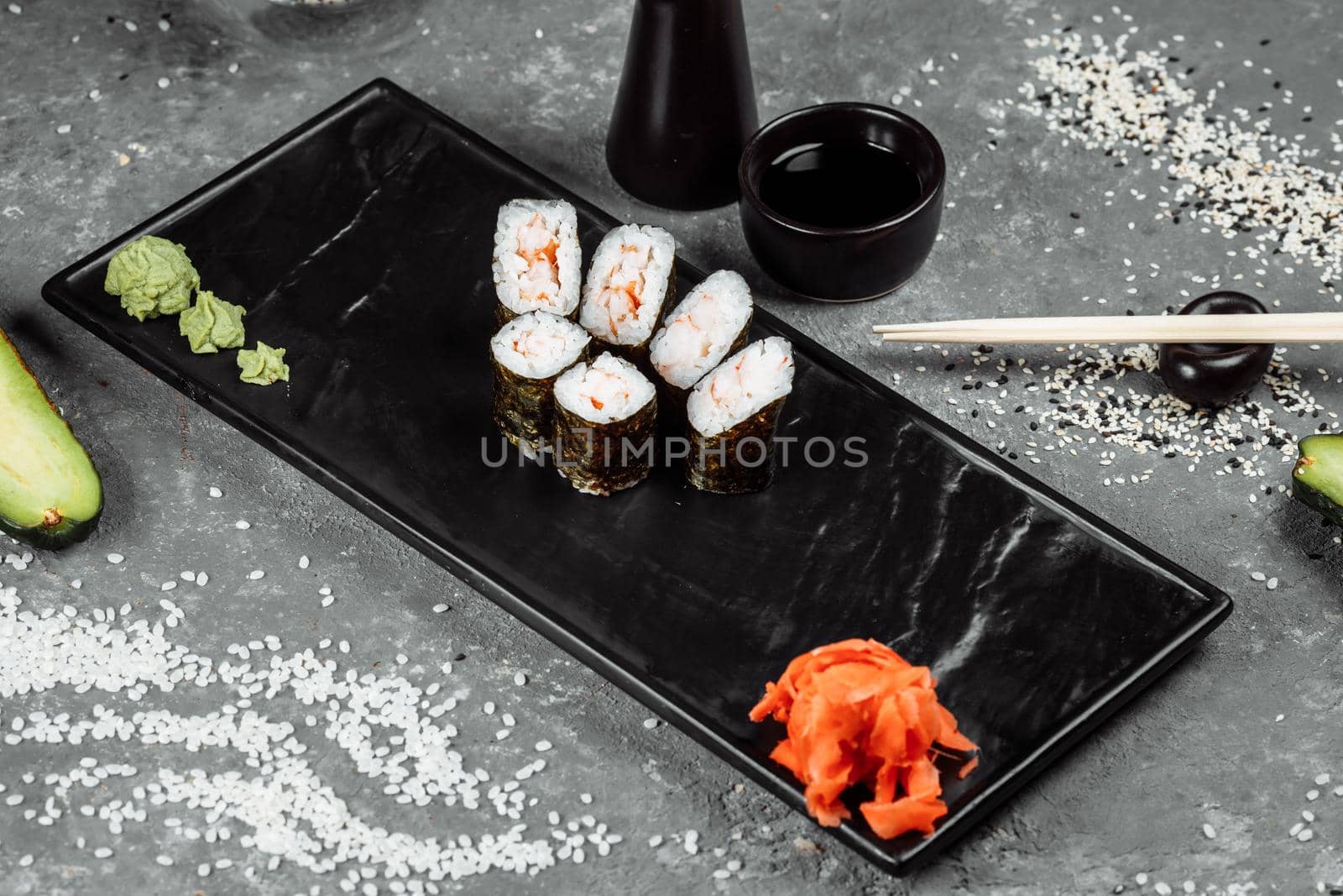 Simple maki with shrimp. Sushi on a gray background by UcheaD