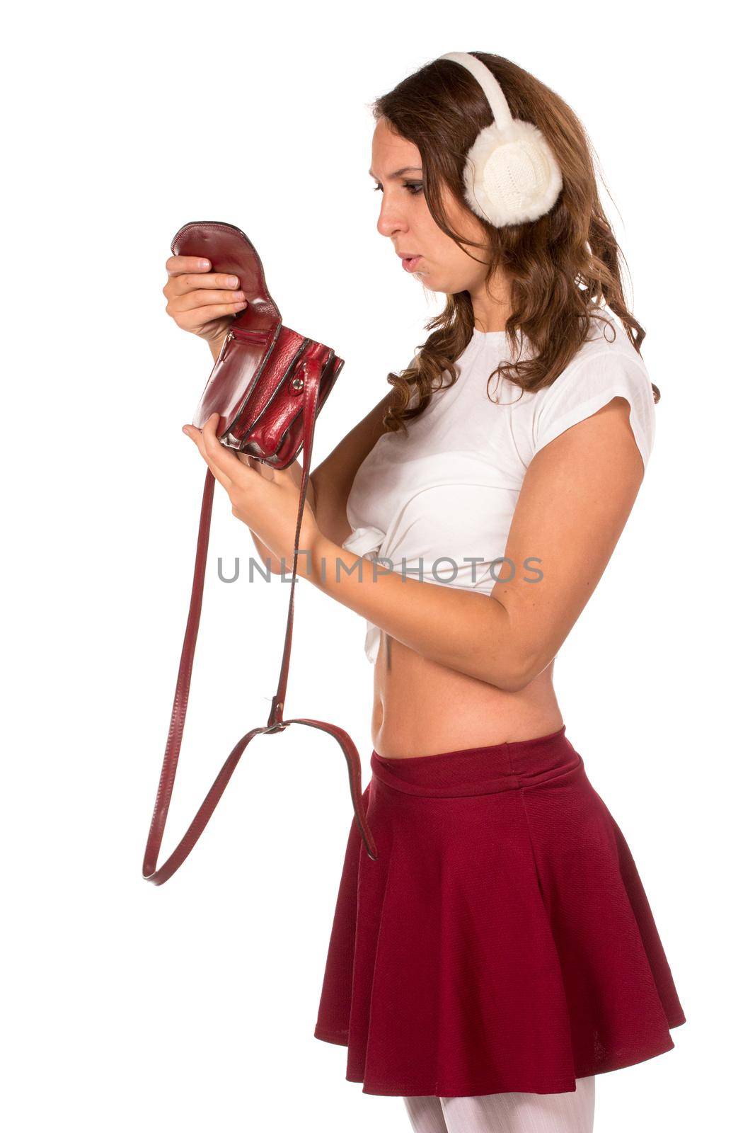 Beautiful woman looking through her pocket book purse, isolated