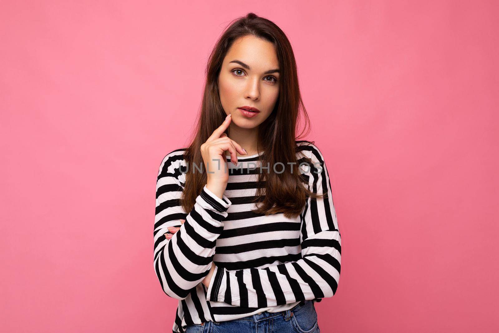 Photo of amazing thoughtful beautiful young woman deep thinking creative female person holding arm on chin wearing stylish outfit isolated on colorful background with copy space.