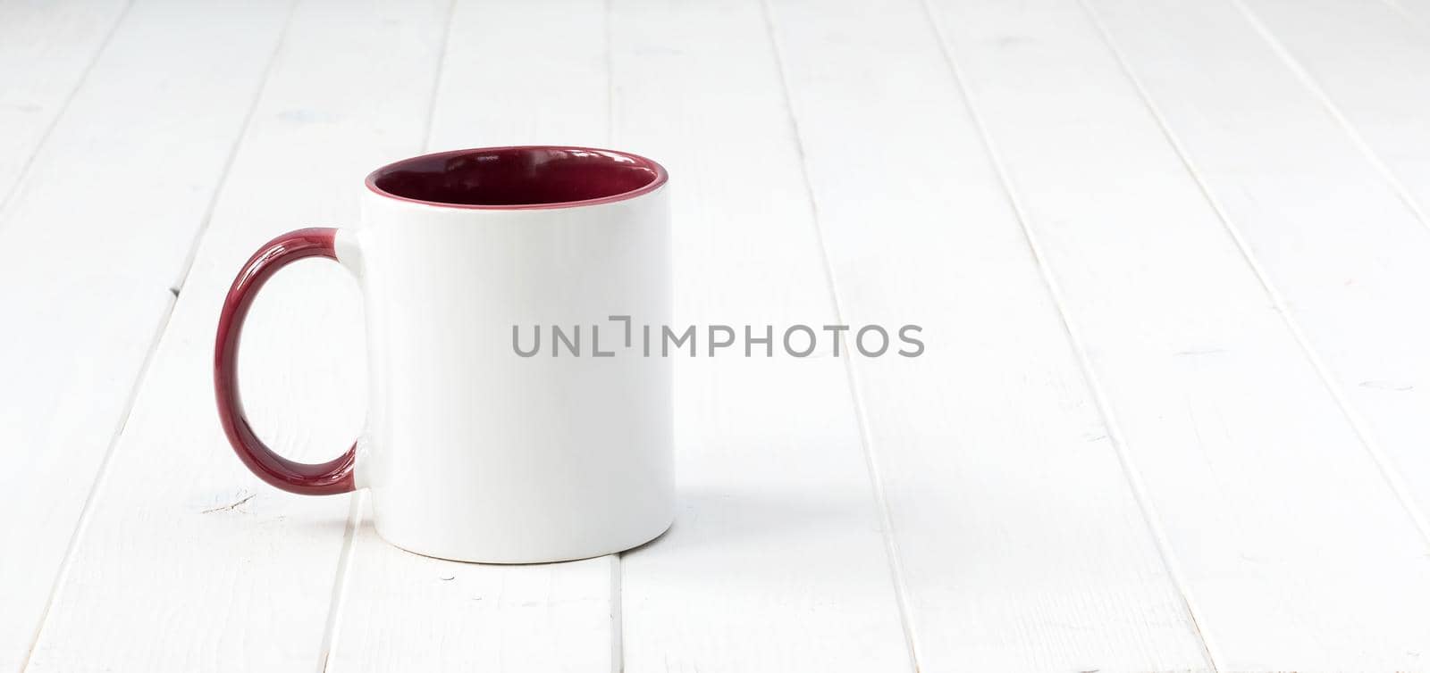 white cup with dark red handle and inside by GekaSkr
