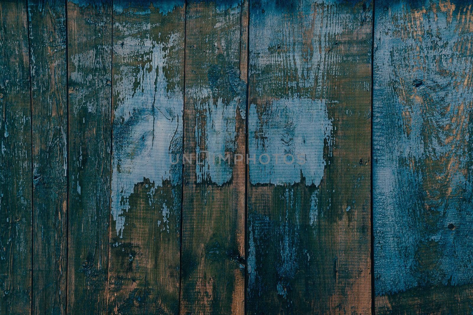 Wooden vertical striped surface of blue color, texture or background