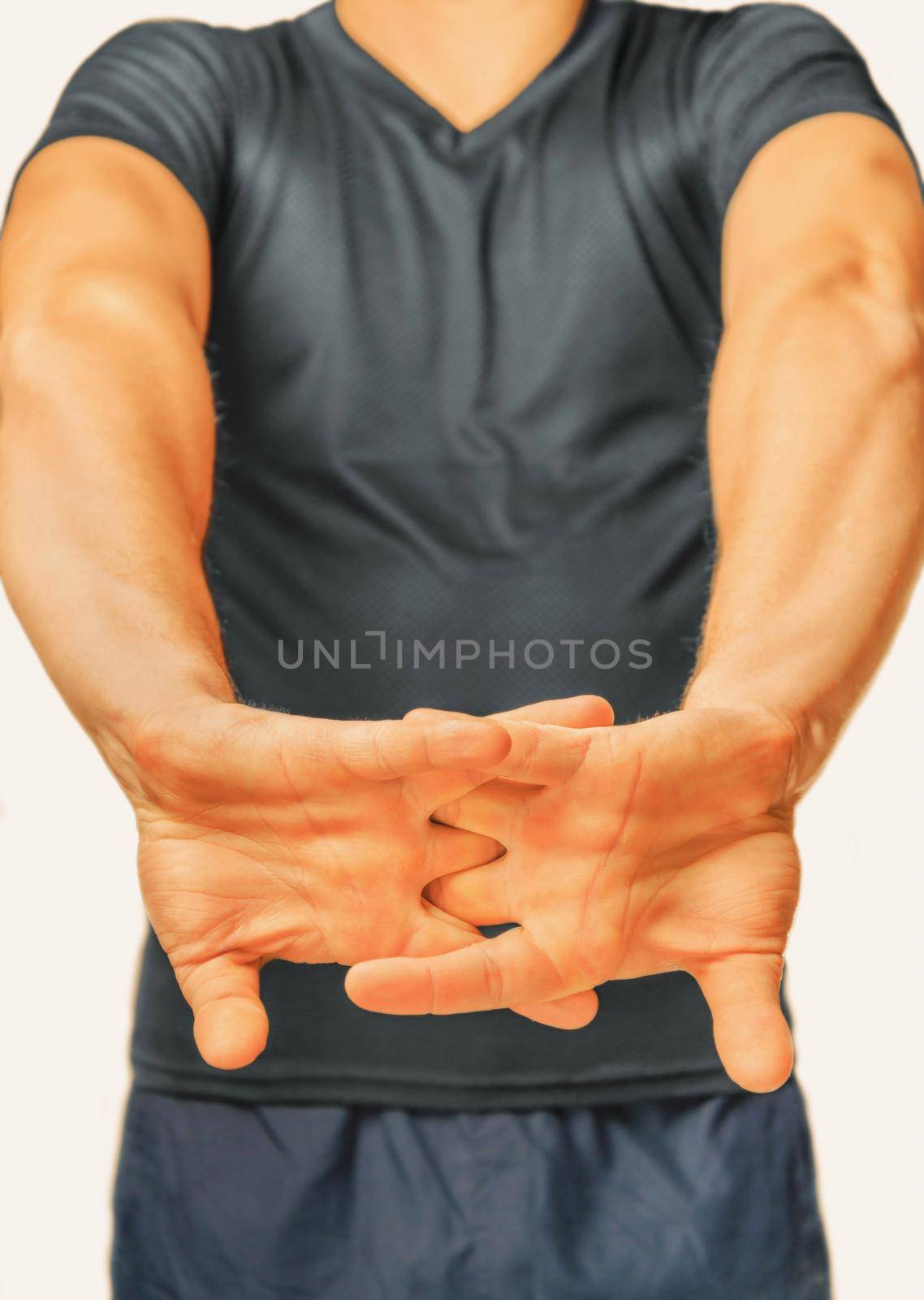 Man unbend fingers on a white background