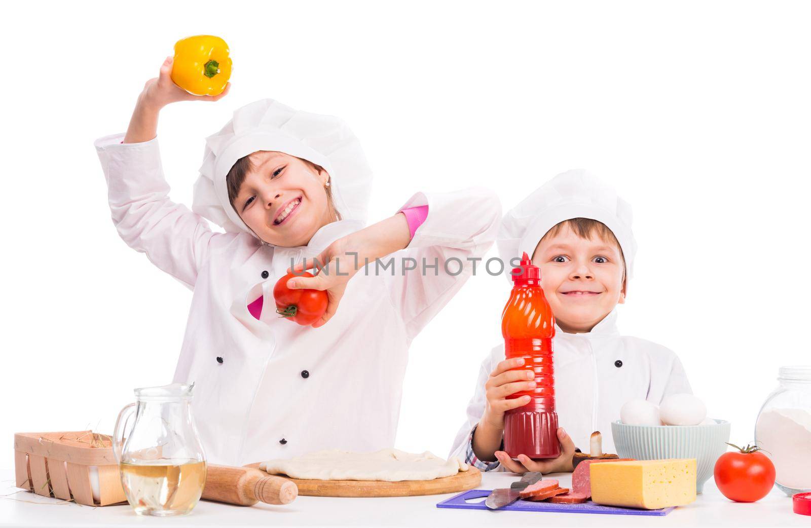 cute little boy and girl with ingredients for pizza by GekaSkr