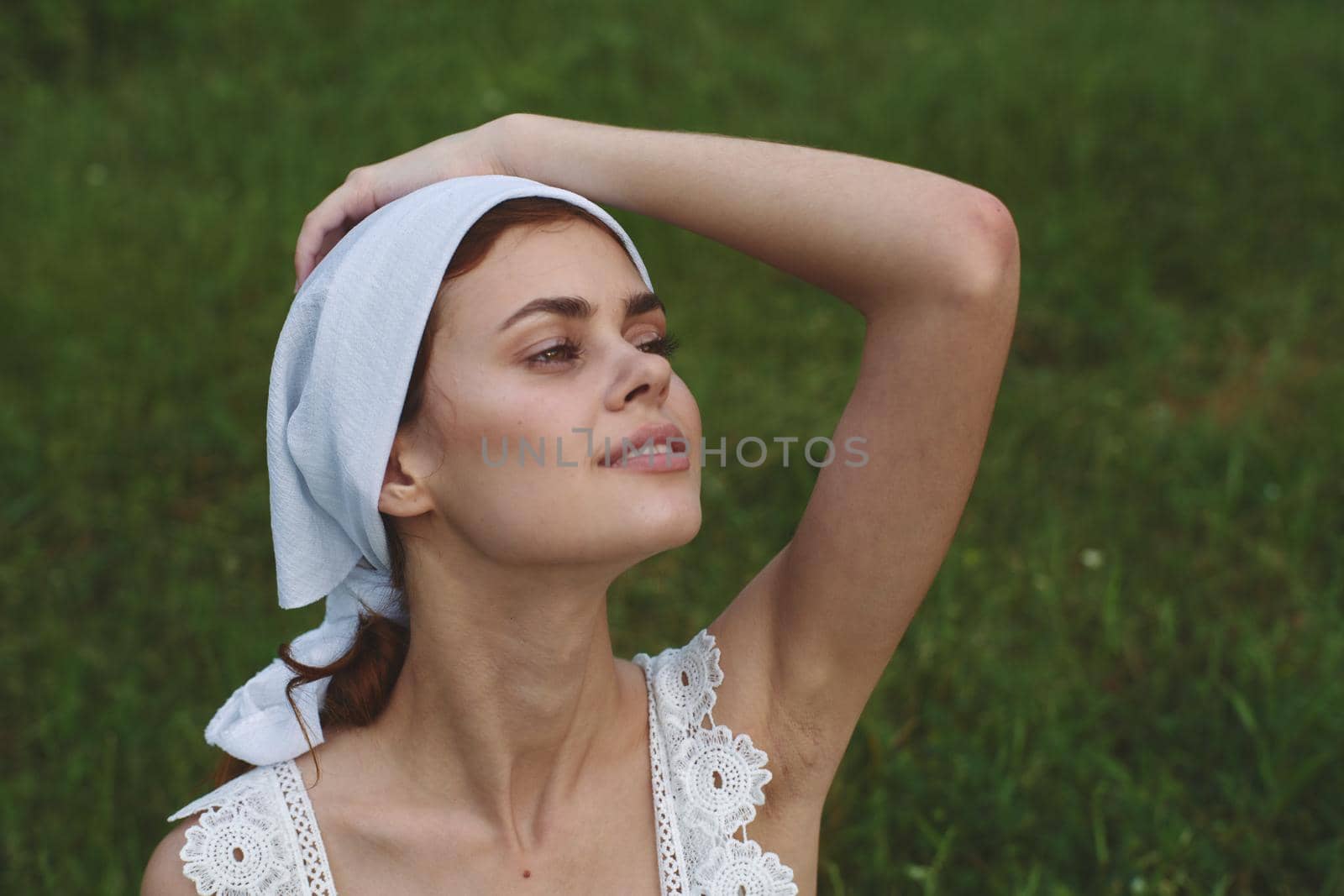 cheerful woman outdoors in the garden countryside ecology nature. High quality photo