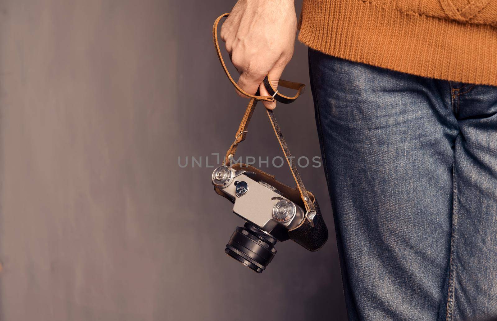 Man with photo camera by alexAleksei
