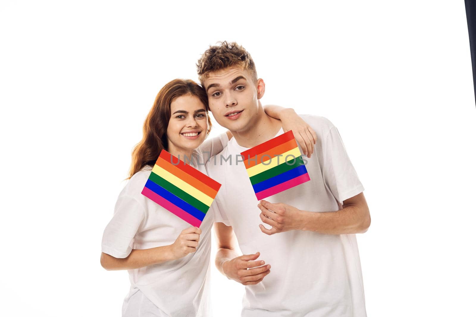 young couple lgbt Flag transgender lifestyle light background. High quality photo