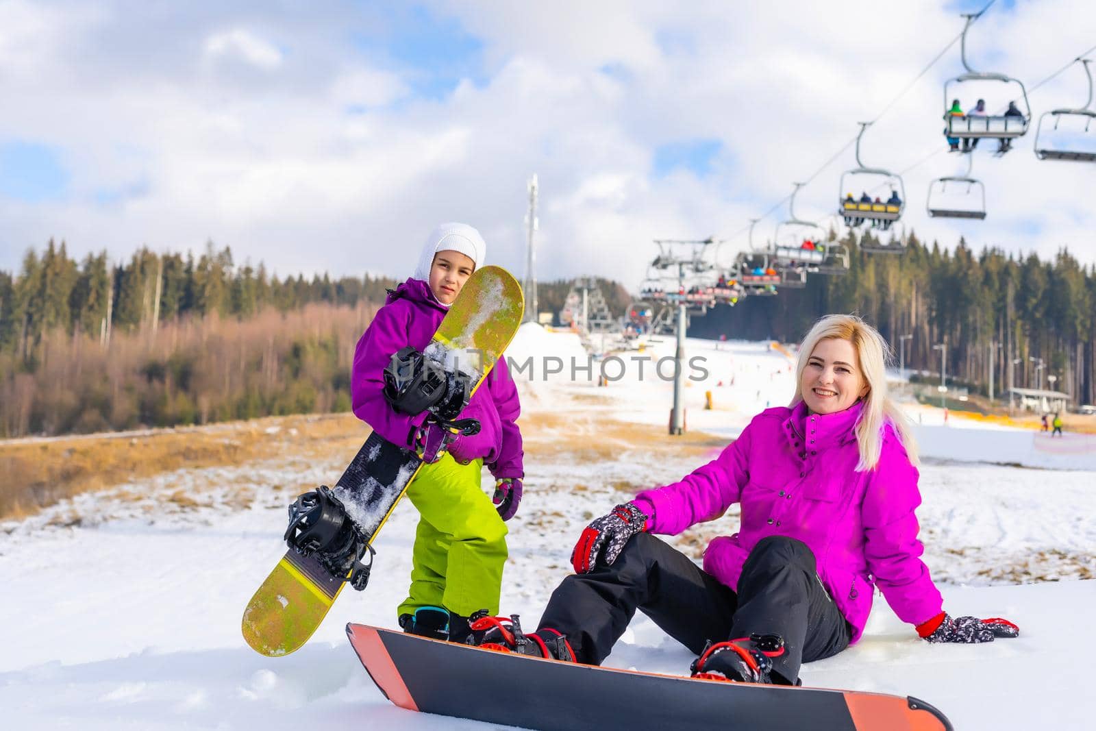 Family winter vacation in ski resort