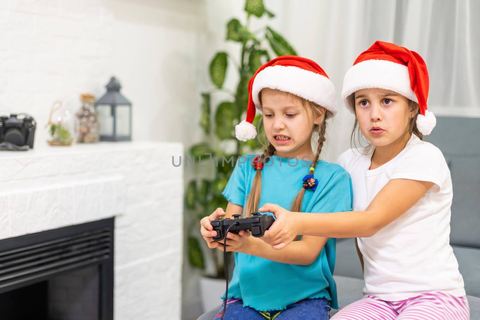 Young girls with virtual reality glasses. VR headset.