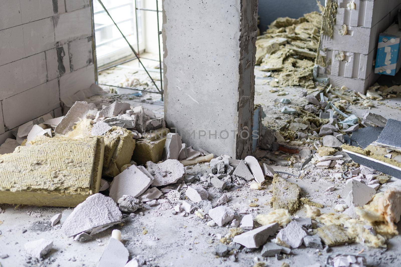 Small apartment without repair in a new building. A room in an unfinished house. Walls of foam block and concrete floor in a tiny apartment.