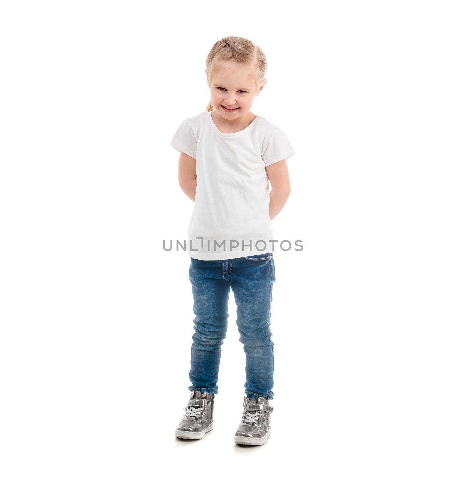 Adorable girl in a white t-shirt standing isolated on white background, lovely hairstyle