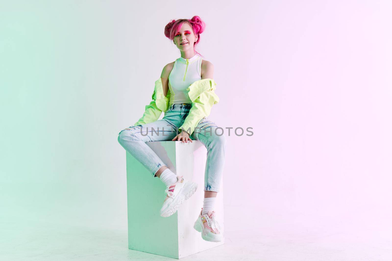 cheerful woman green jacket fashionable clothes studio model. High quality photo