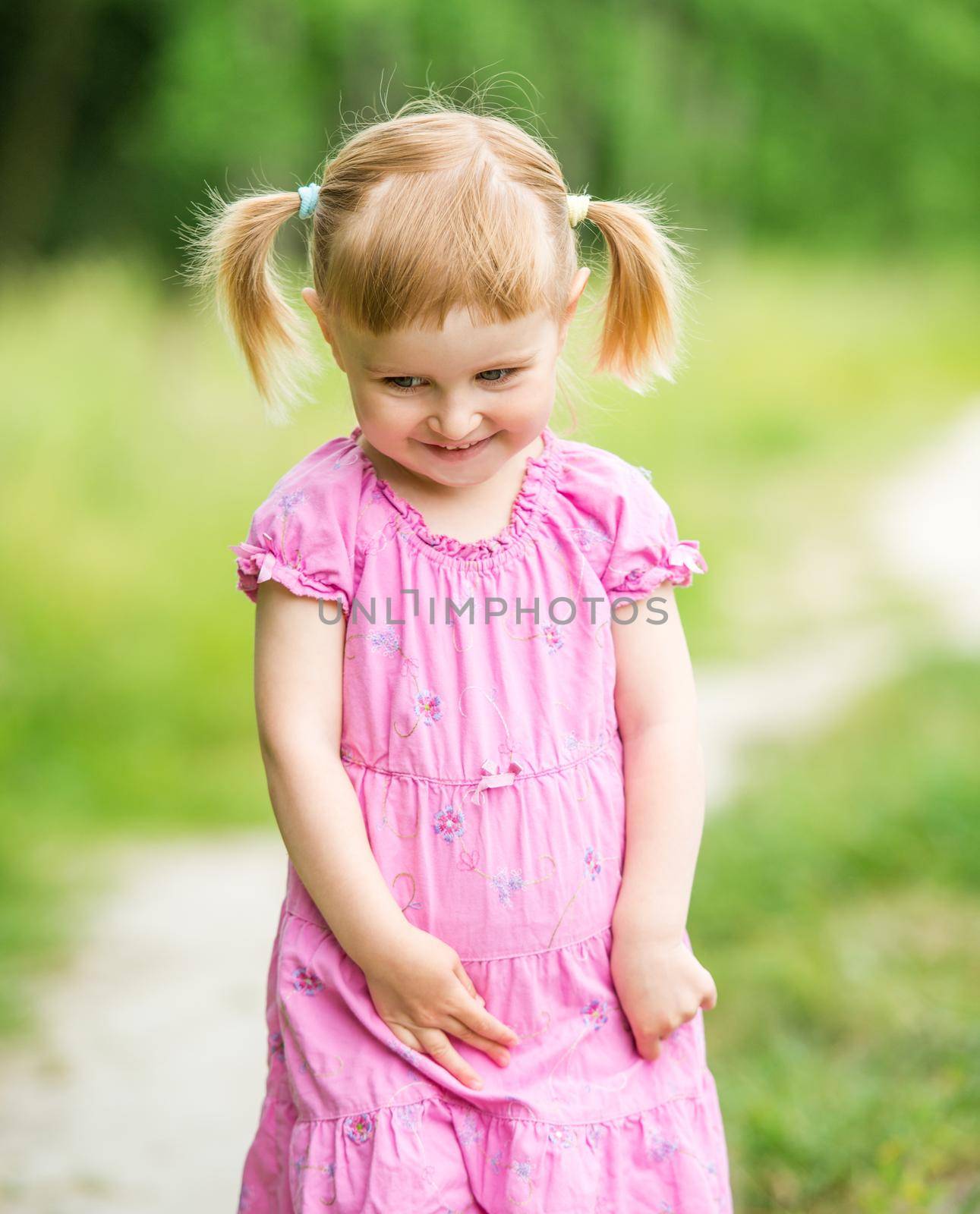 Cute little girl on the meadow by tan4ikk1