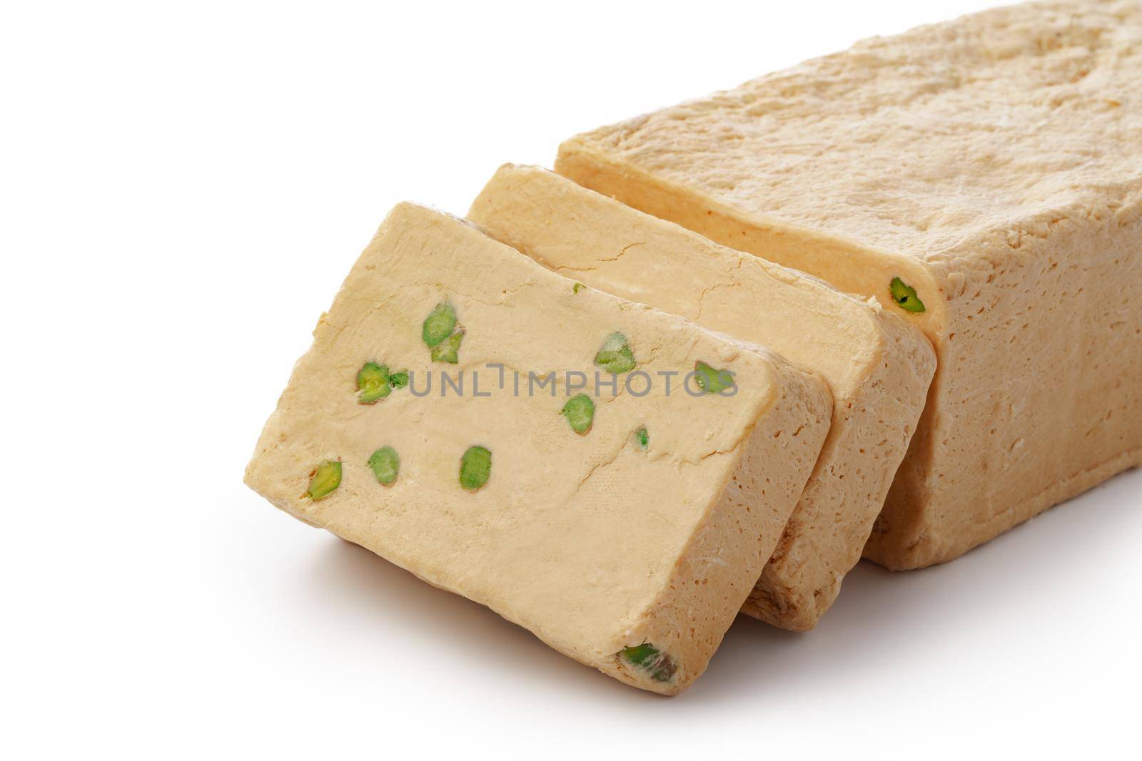 Turkish dessert halva slices isolated on white background