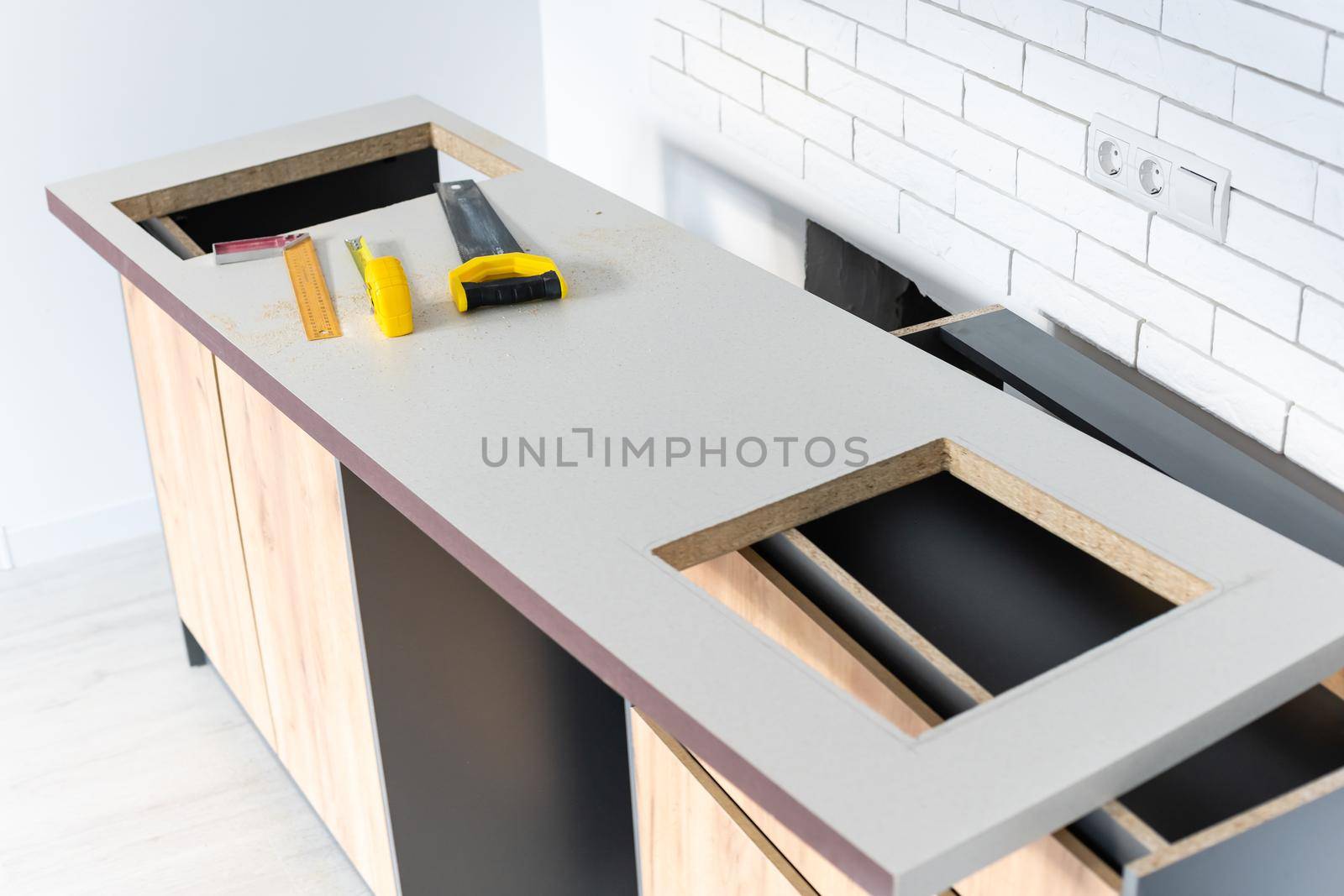 to cut holes in the kitchen countertop for equipment
