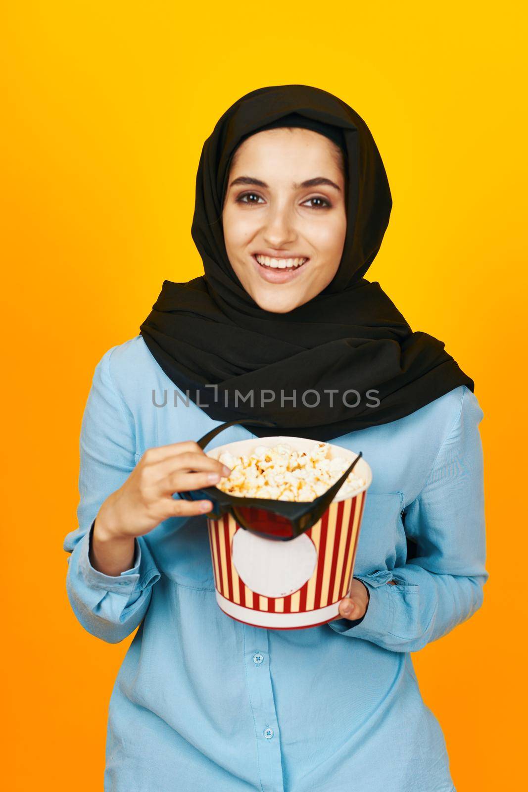 Muslim joy leisure posing fashion yellow background. High quality photo