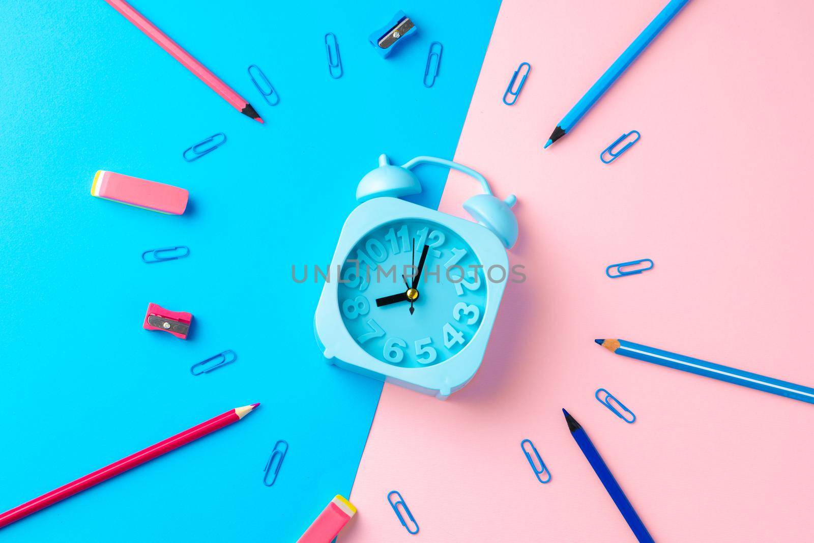 Back to school. Scattered stationery on paper background top view