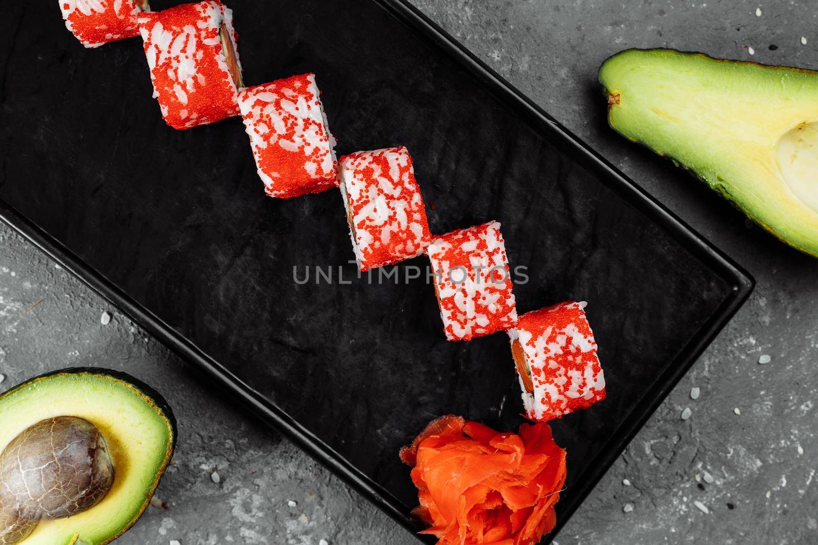 California sushi style rolls, with raw vegetables, food border background.