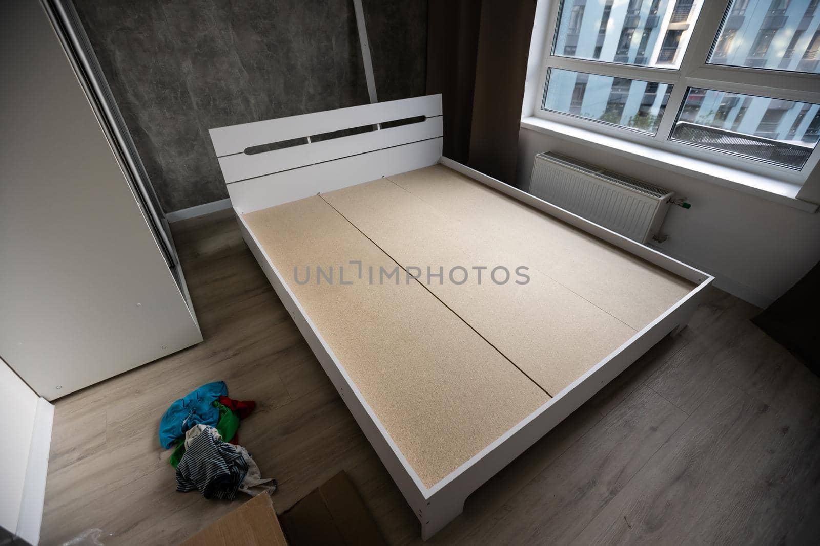 assembly of a double bed made of wood and lamella by Andelov13