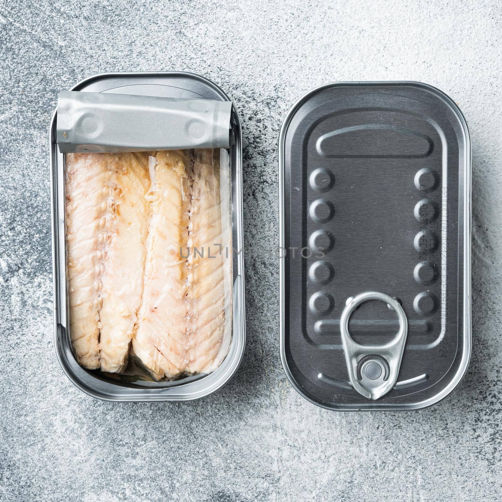 Canned Mackerel fillet, fish preserves set, in tin can, on gray background, top view flat lay, square format