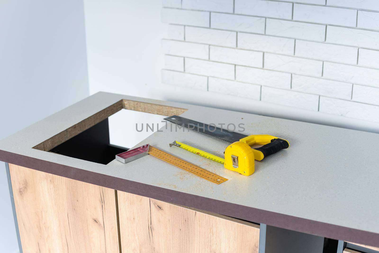 In the kitchen, the square is square-cut for installation of the countertop