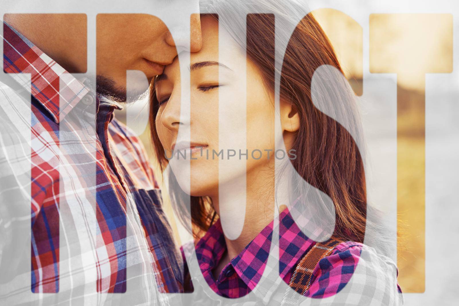 Double exposure word trust combined with image of couple in love outdoor