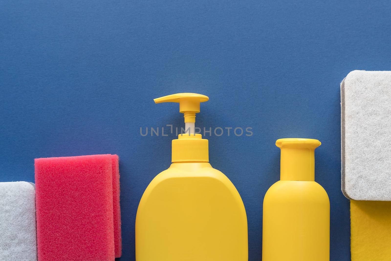 Colorful cleaning set for different surfaces in kitchen, bathroom and other rooms.