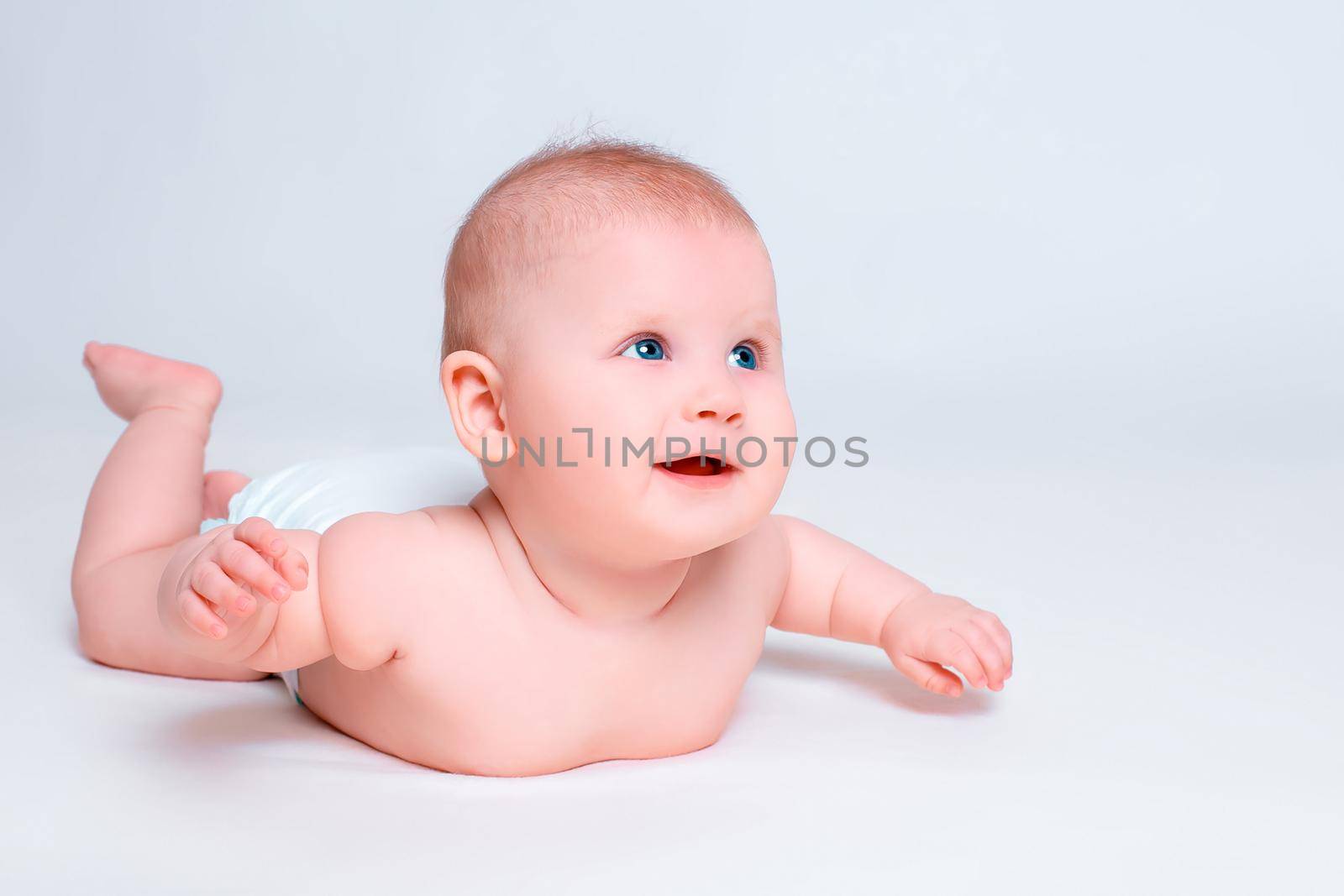 Cute baby girl on white background . Baby in diaper