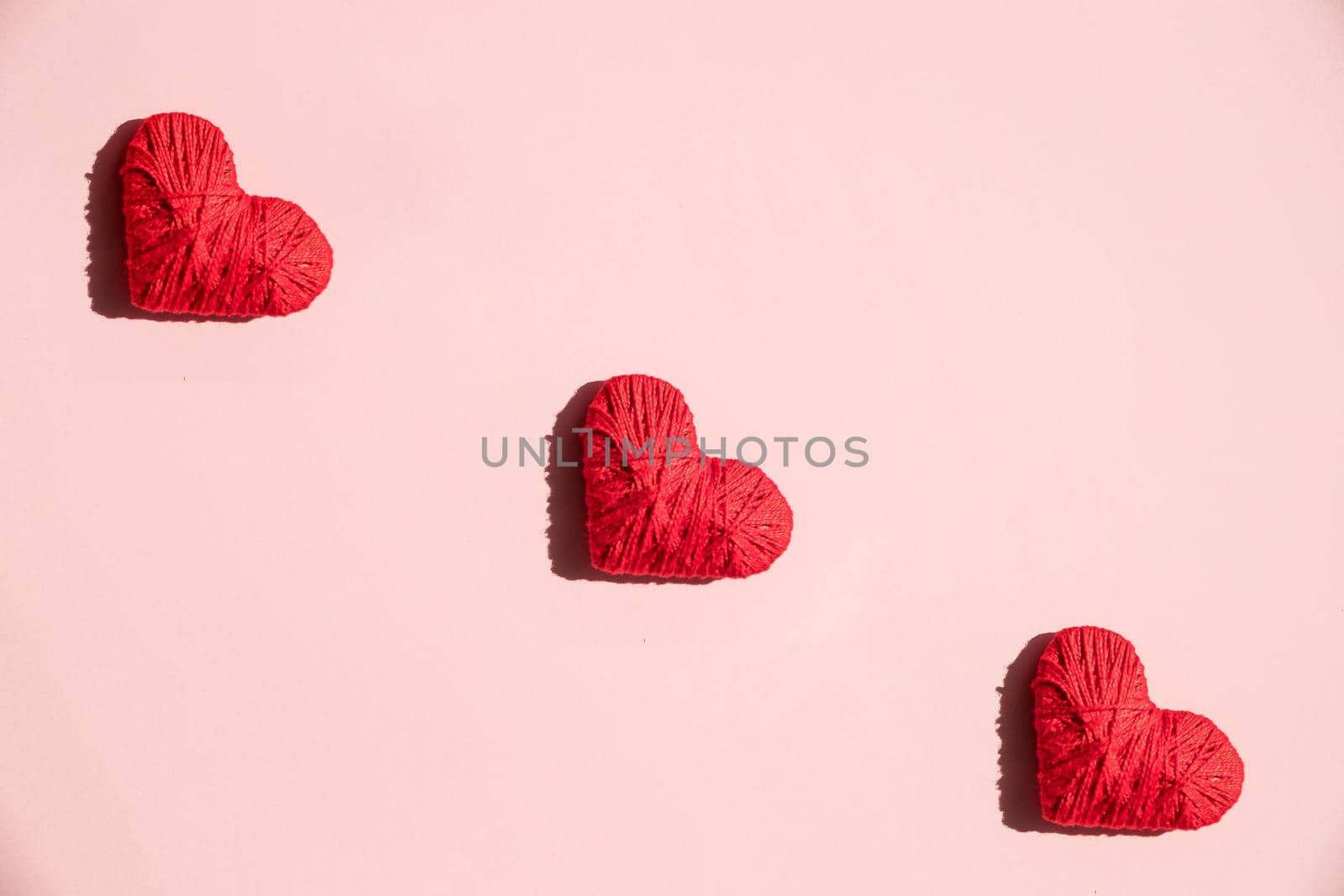 Paper heart shape decoration on white background. Love concept. Flat lay.