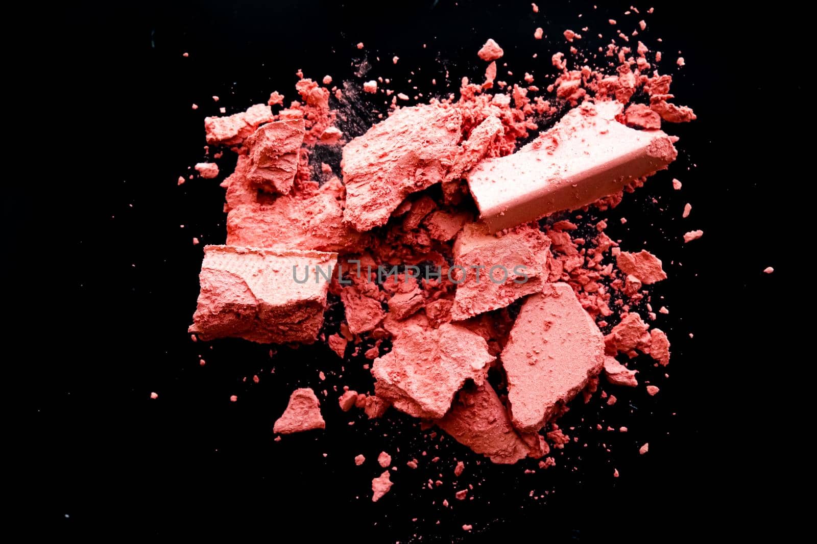 Crushed cosmetics, mineral organic eyeshadow, blush and cosmetic powder isolated on black background, makeup and beauty banner, flatlay design by Anneleven