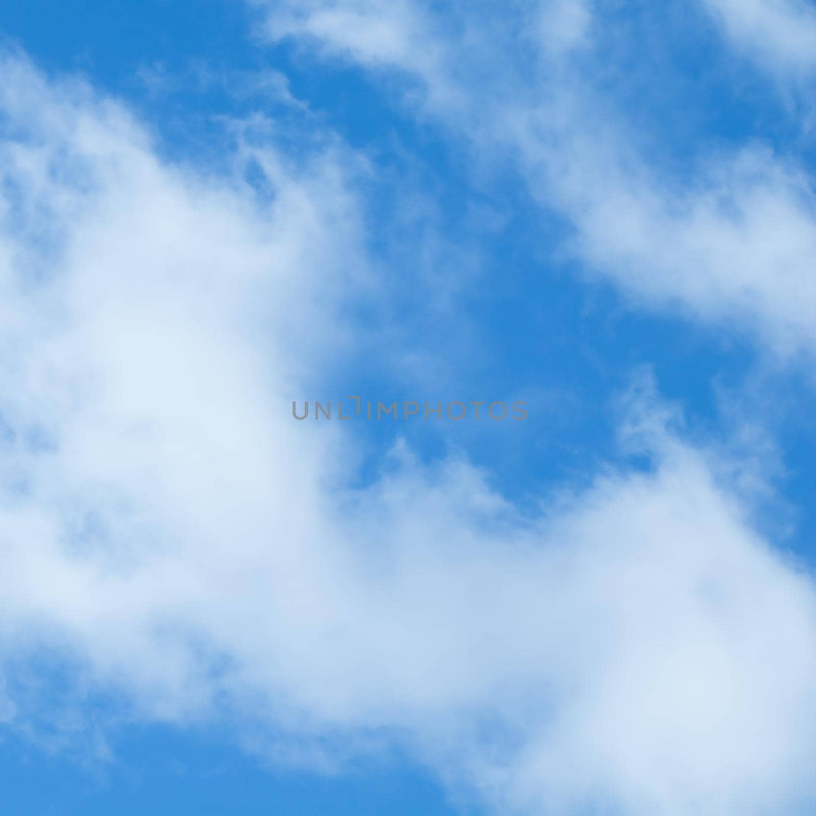 Background of blue sky with white clouds.