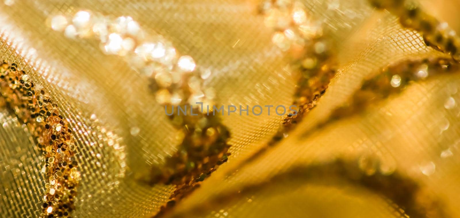 Golden abstract blur defocused background. Concept for New Years Eve, Christmas and happy holidays.