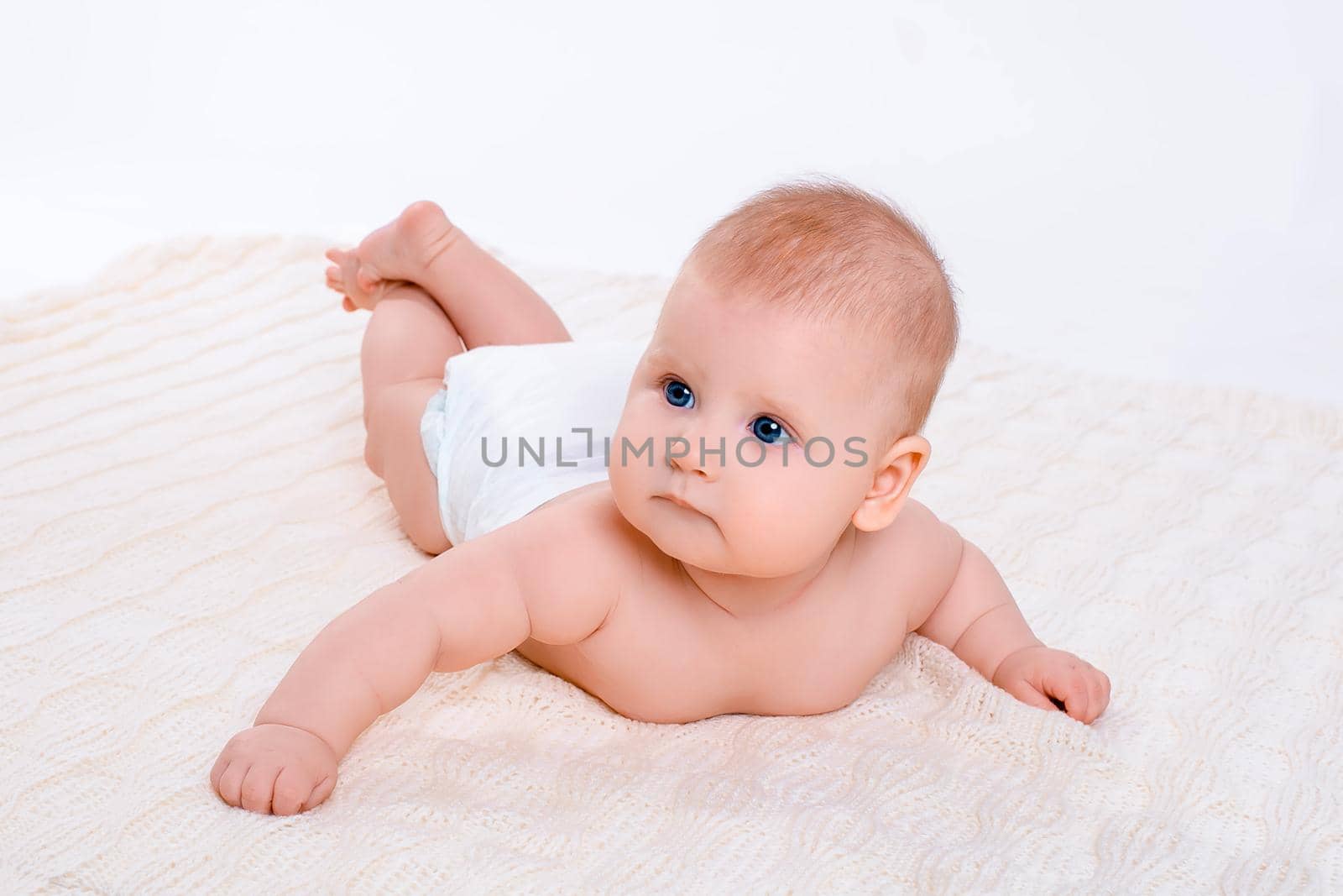 Cute baby girl on white background with isolation. Baby in diaper