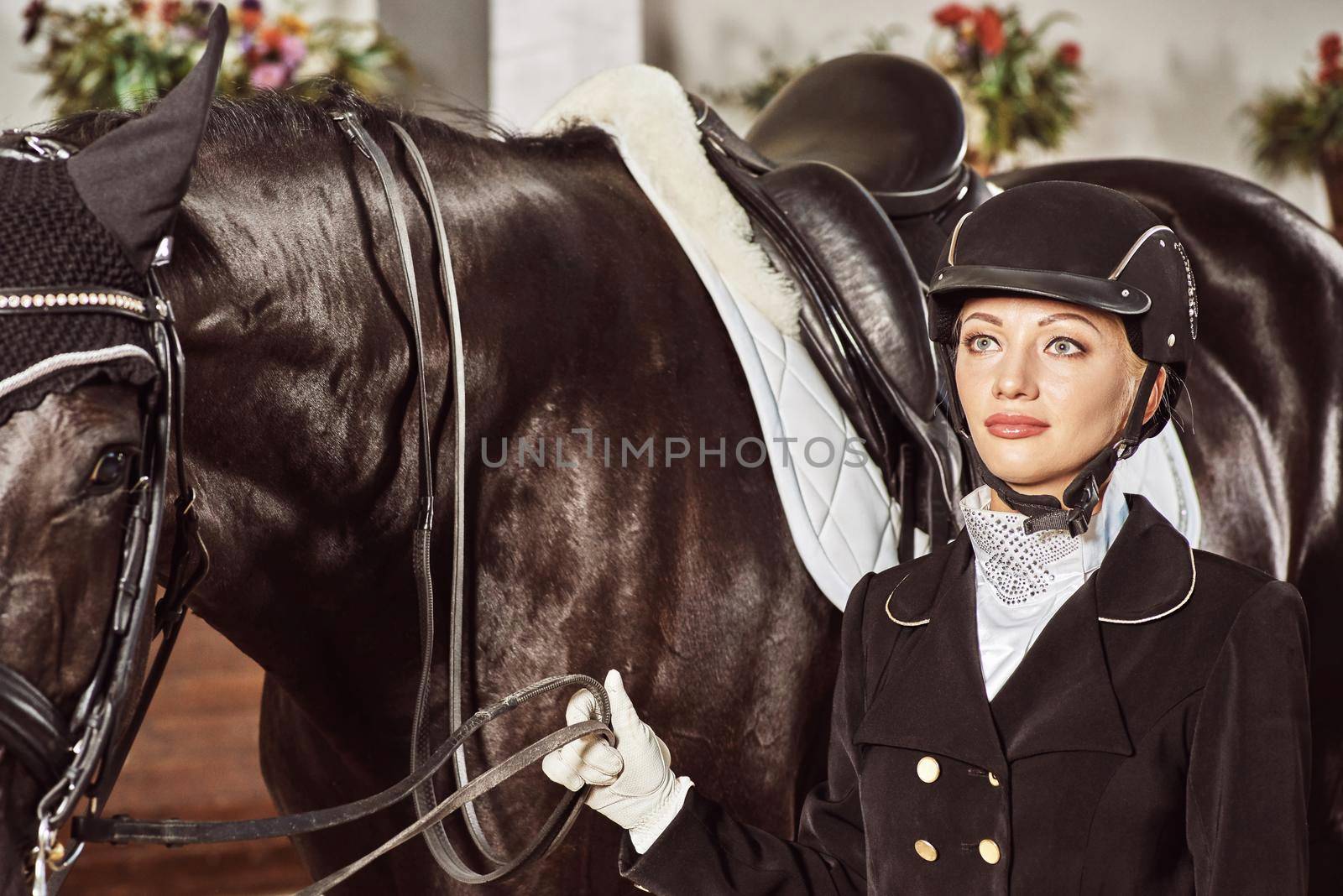 woman jockey with his horse by nazarovsergey