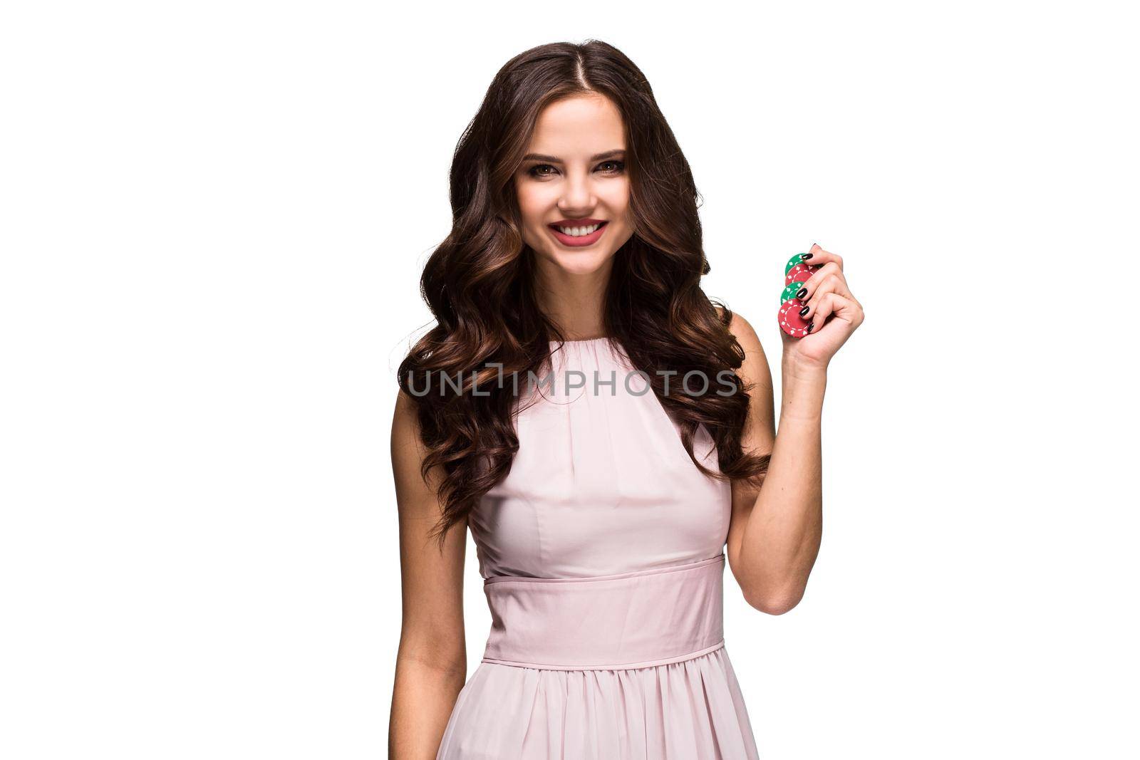 Sexy curly hair brunette posing with chips in her hands, poker concept isolation on white background Casino, poker, Roulette Blackjack Spin. Big win emotions